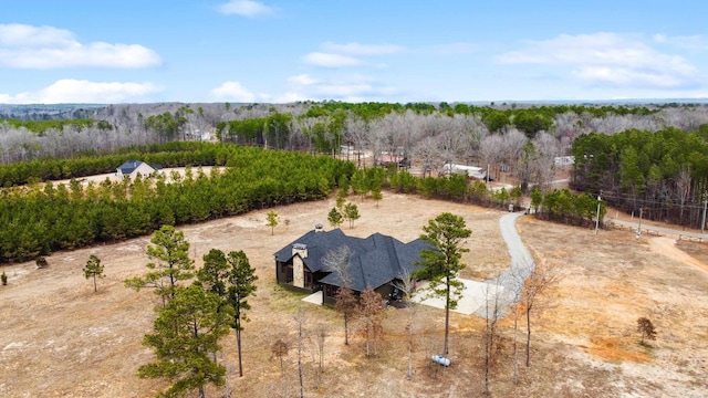 birds eye view of property with a rural view