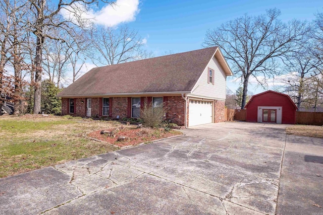 view of front of house with brick siding, roof with shingles, concrete driveway, an attached garage, and fence