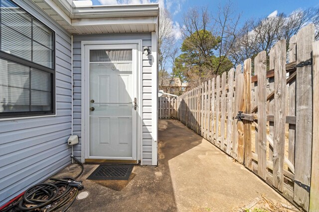 property entrance with fence