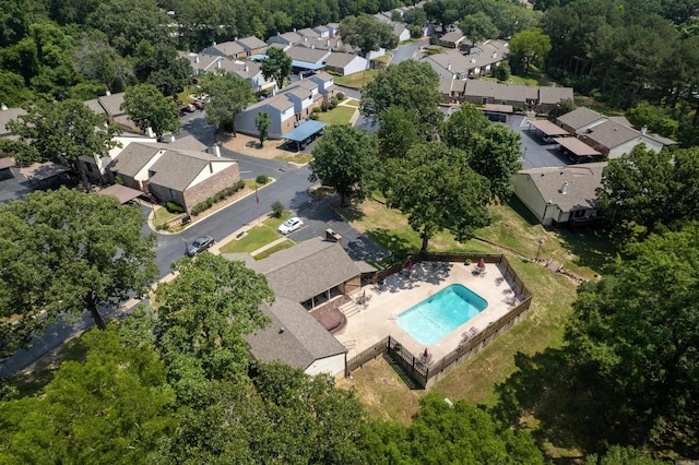 birds eye view of property with a residential view