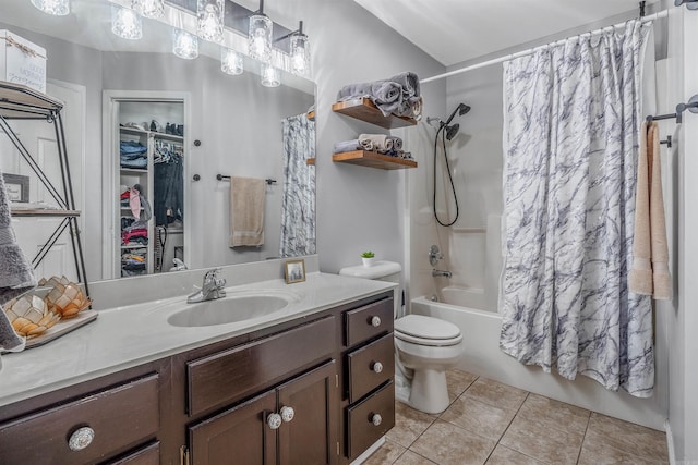 full bath with vanity, shower / bath combination with curtain, toilet, and tile patterned floors