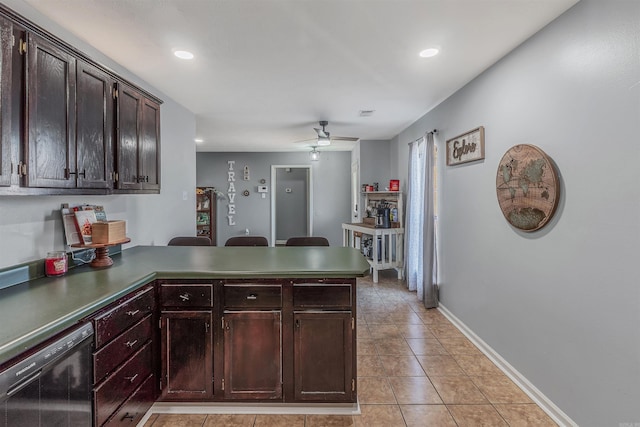 kitchen featuring light tile patterned floors, a ceiling fan, dishwasher, a peninsula, and baseboards