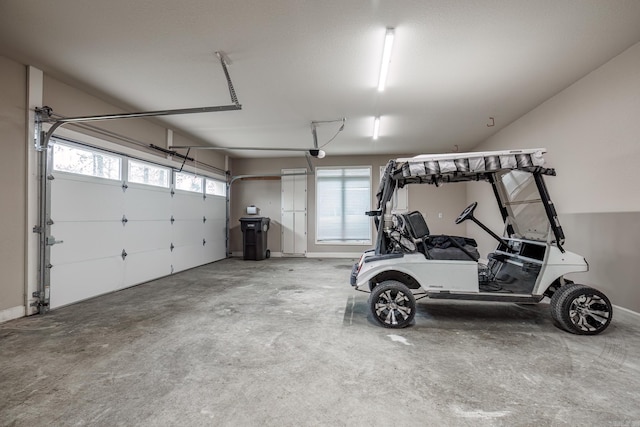 garage with baseboards