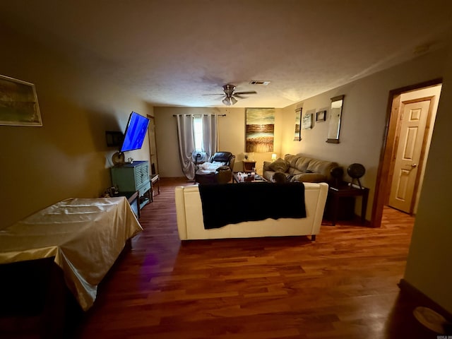 504-506514-516 S Pool, Austin, AR 72023 - living area with a ceiling fan, visible vents, and wood finished floors
