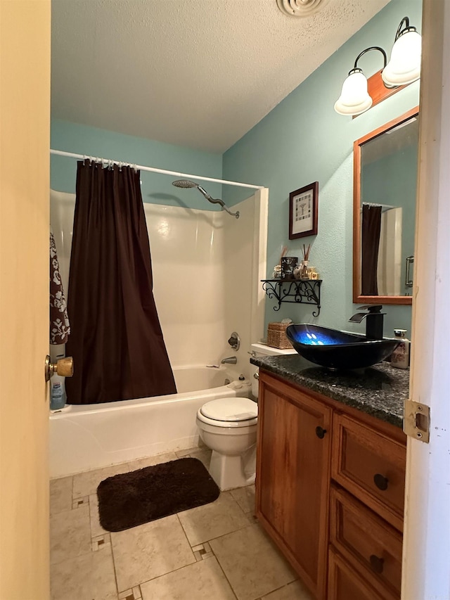 bathroom with shower / bath combination with curtain, toilet, a textured ceiling, vanity, and tile patterned flooring