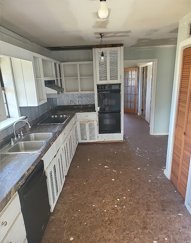 kitchen featuring dark countertops, ventilation hood, black appliances, open shelves, and a sink