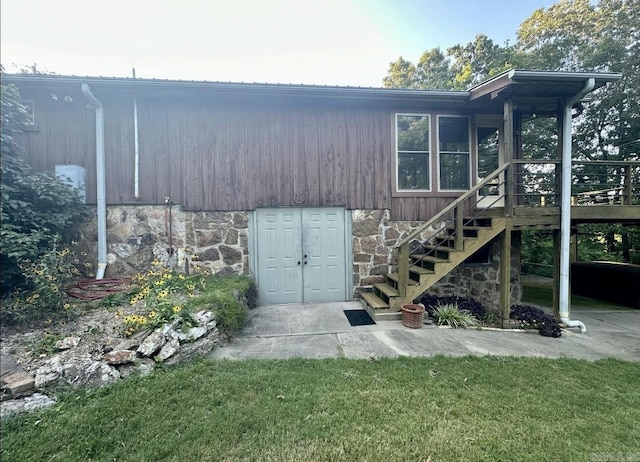 view of outbuilding with stairs