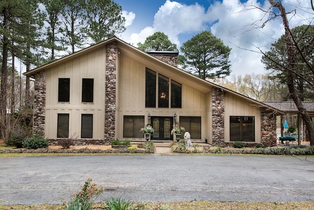 view of property exterior with french doors