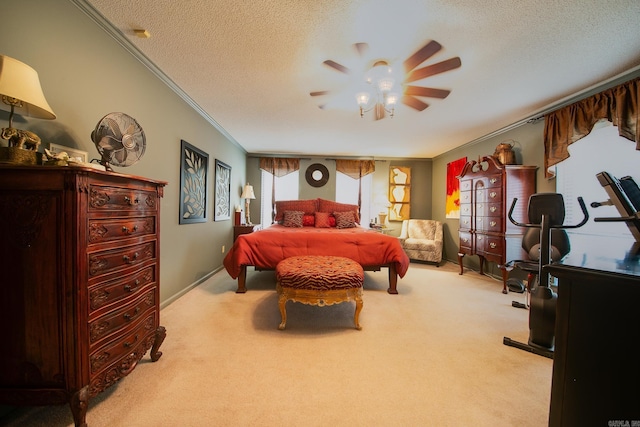 bedroom featuring carpet floors, crown molding, a textured ceiling, and ceiling fan