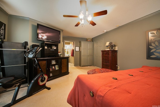 bedroom with crown molding, a ceiling fan, and light colored carpet