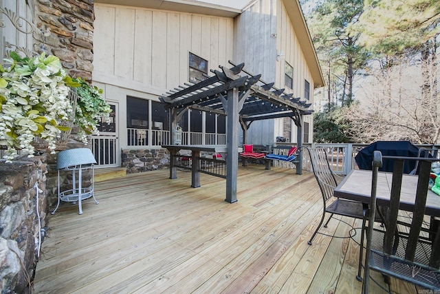 wooden terrace with a pergola