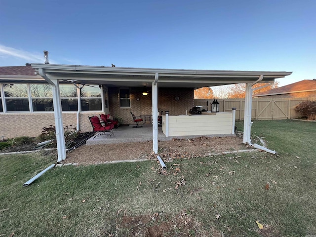 exterior space featuring a patio area and fence