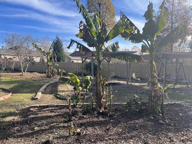 view of yard featuring fence