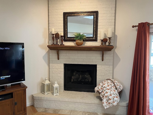 room details with a fireplace and baseboards