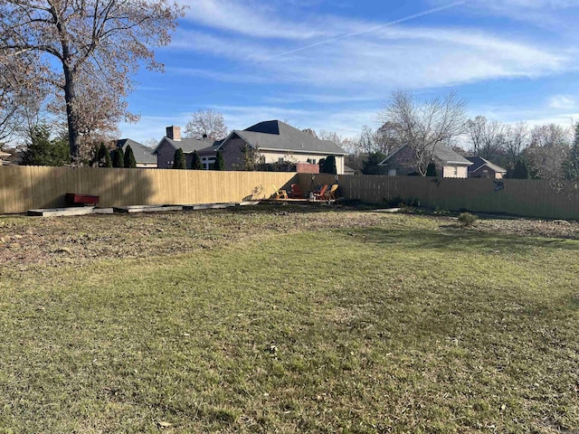 view of yard featuring a fenced backyard