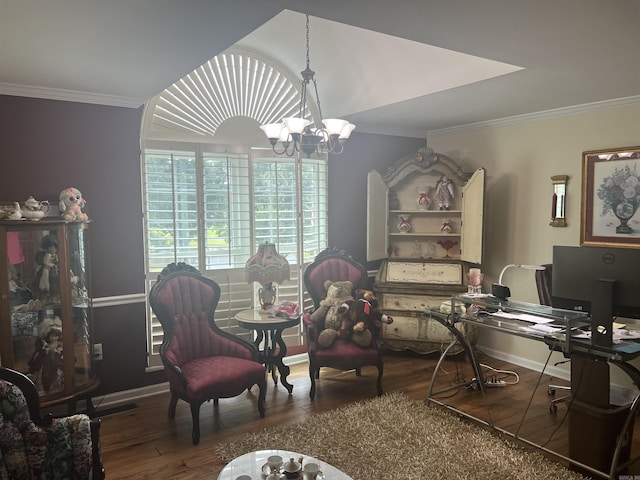 office area featuring crown molding, baseboards, wood finished floors, and an inviting chandelier