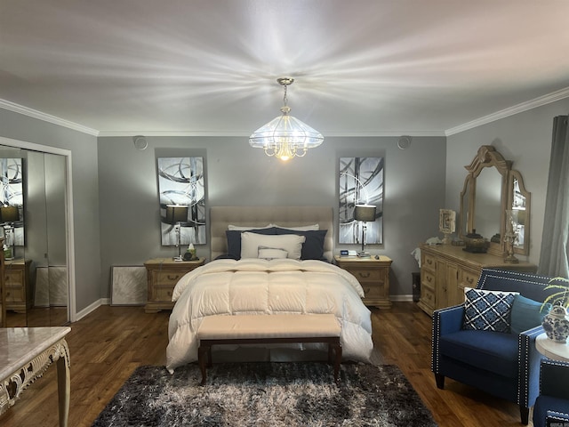 bedroom with baseboards, wood finished floors, and crown molding