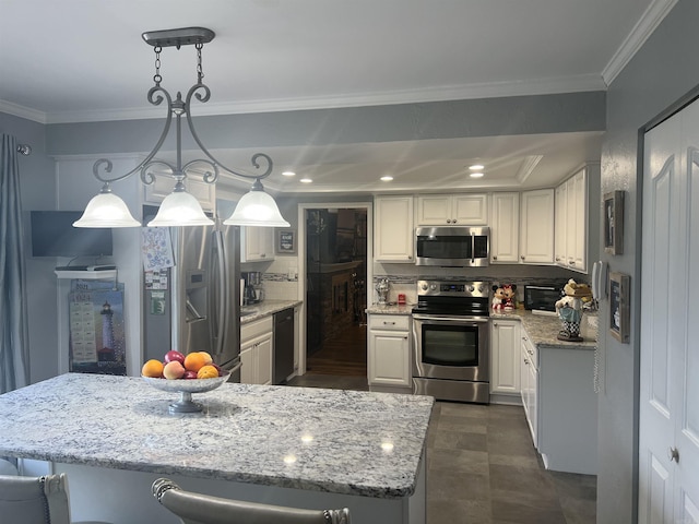 kitchen with light stone countertops, stainless steel appliances, crown molding, pendant lighting, and backsplash