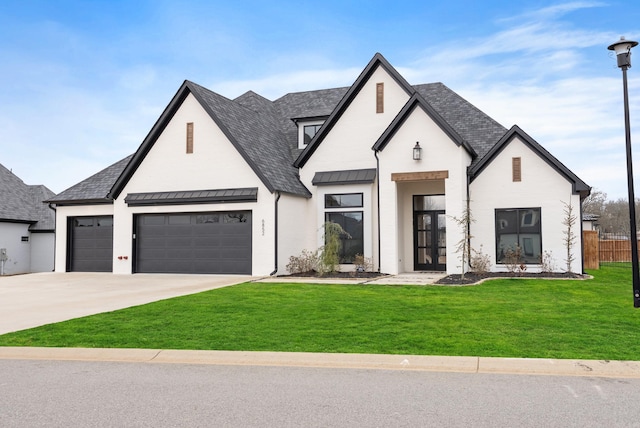 view of front of home featuring metal roof, fence, driveway, a standing seam roof, and a front yard