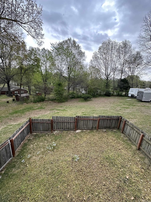 view of yard with a fenced backyard