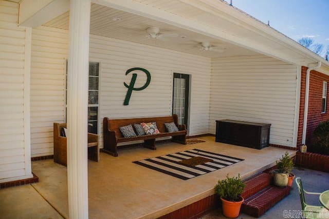 view of patio featuring ceiling fan and an outdoor living space