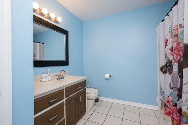 full bath with vanity, tile patterned flooring, toilet, and baseboards