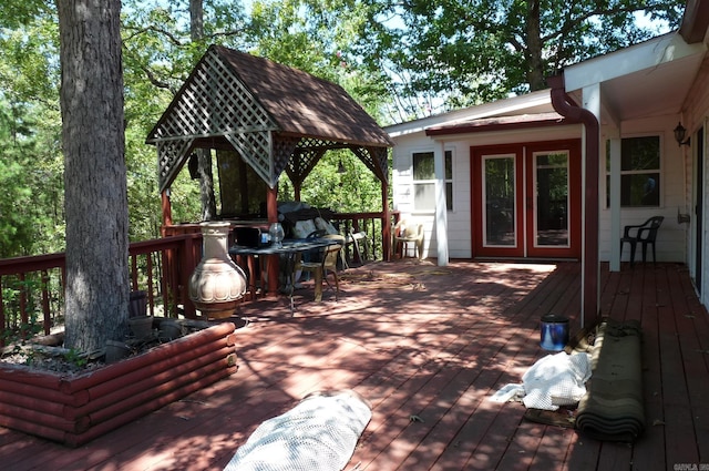 wooden deck with a gazebo