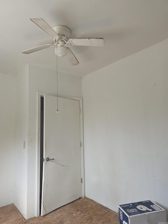 interior space featuring a ceiling fan