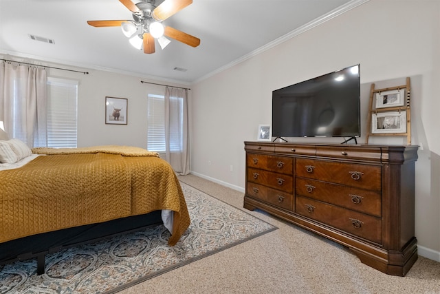 bedroom featuring light colored carpet, a ceiling fan, baseboards, visible vents, and ornamental molding