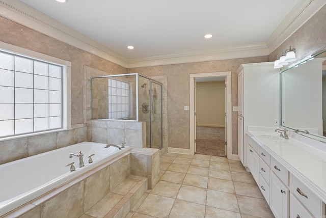 bathroom featuring tile patterned floors, a garden tub, crown molding, vanity, and a shower stall