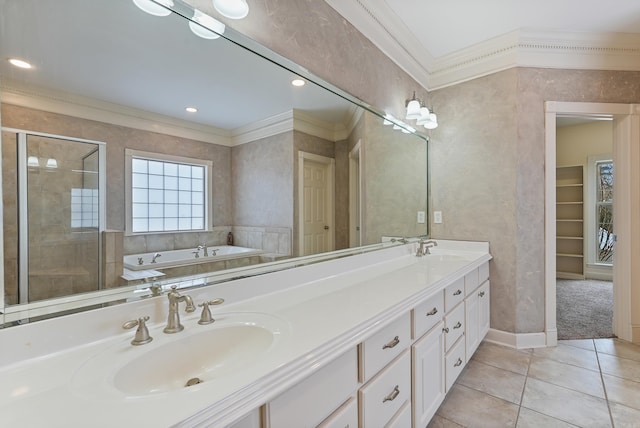 full bath featuring ornamental molding, a sink, and tile patterned floors