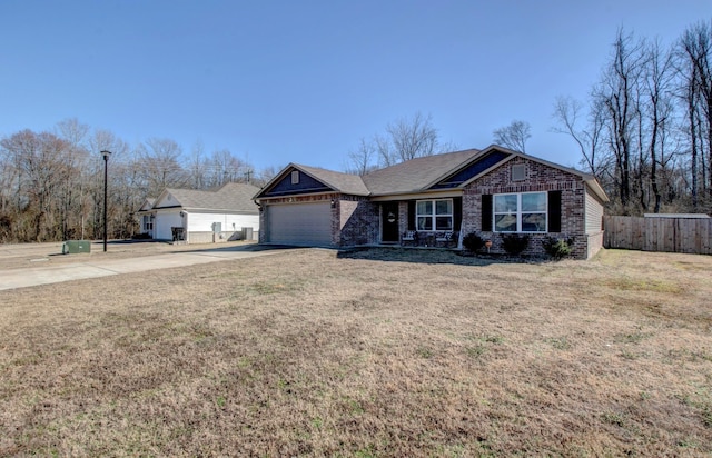 ranch-style home with a garage, brick siding, fence, concrete driveway, and a front yard