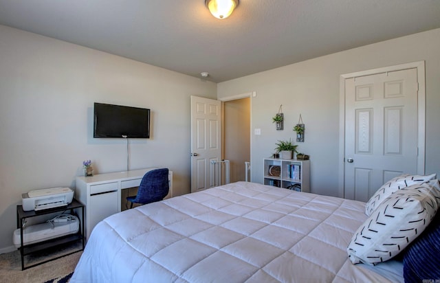 bedroom featuring carpet