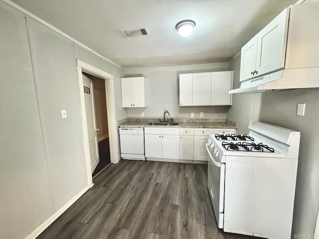 kitchen featuring white appliances, dark wood-type flooring, a sink, visible vents, and white cabinets