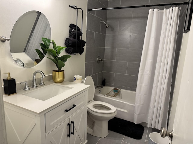 full bath featuring shower / tub combo, vanity, toilet, and tile patterned floors