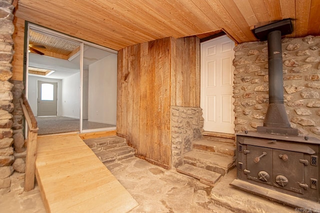 interior space featuring wooden ceiling and wood finished floors