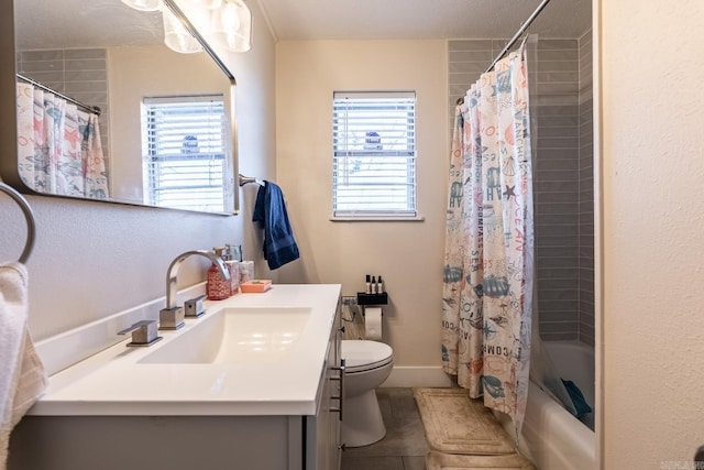 full bath with toilet, shower / bath combo, vanity, tile patterned flooring, and baseboards