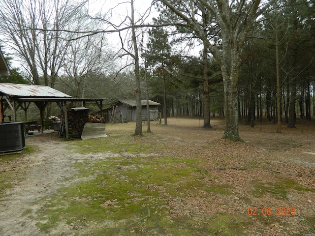 view of yard with cooling unit and a gazebo