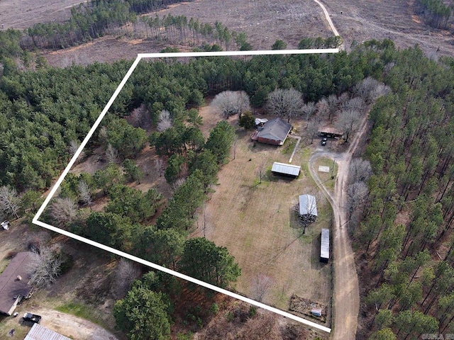 aerial view with a wooded view