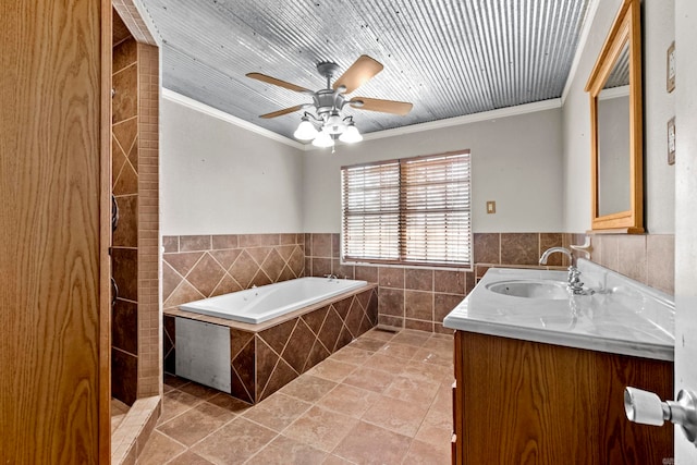 1580 Ridge Rd, El Paso, AR 72045 - full bathroom with a bath, ornamental molding, vanity, and tile walls