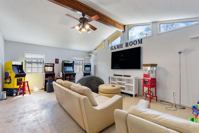 living room featuring a textured ceiling, concrete flooring, vaulted ceiling with beams, a ceiling fan, and baseboards