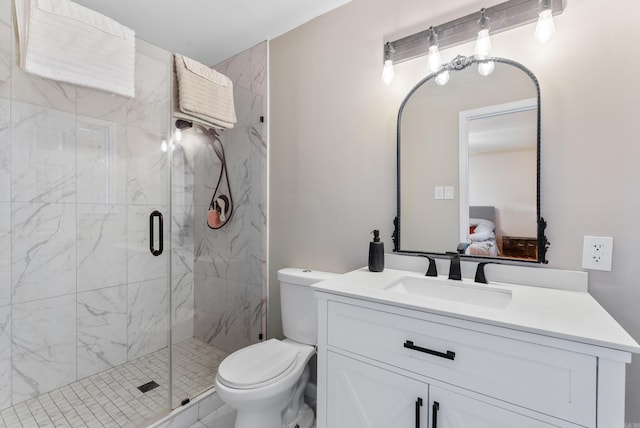 bathroom featuring toilet, vanity, and a marble finish shower