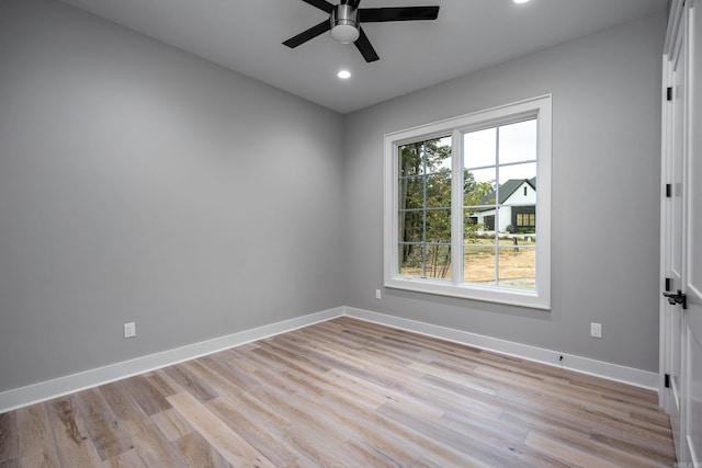 unfurnished room with recessed lighting, ceiling fan, light wood finished floors, and baseboards