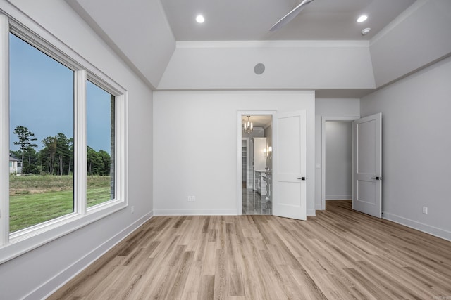 unfurnished bedroom with baseboards, recessed lighting, ensuite bath, and light wood-style floors