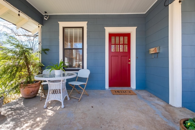 doorway to property featuring a porch