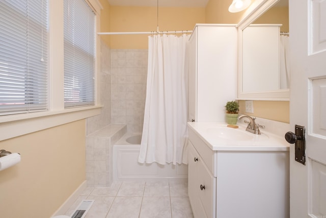 bathroom with visible vents, shower / bath combo with shower curtain, vanity, and tile patterned floors