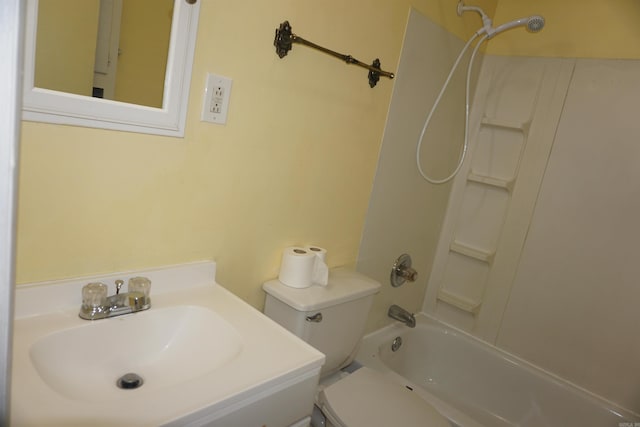 bathroom with  shower combination, toilet, and vanity