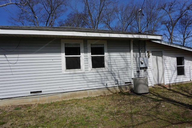 view of side of property featuring crawl space