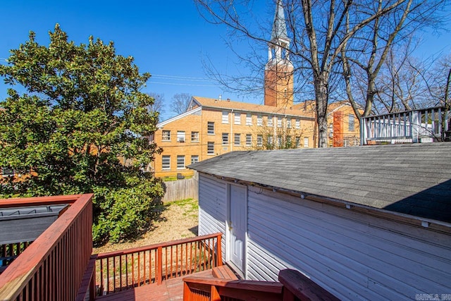 wooden deck featuring fence