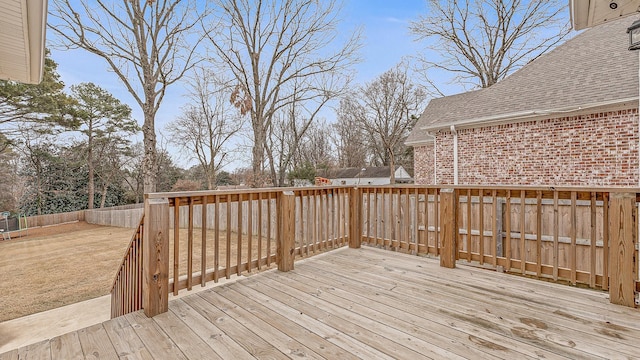 wooden deck featuring fence